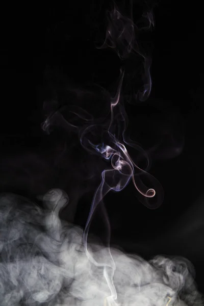 Rich swirls of smoke, black background — Stock Photo, Image