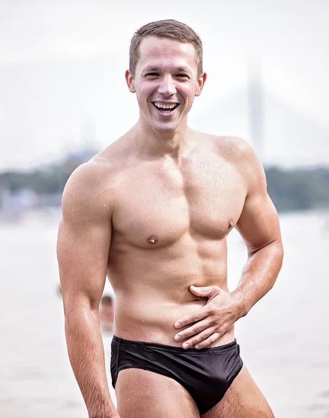 Sexy muscular man on the beach — Stock Photo, Image