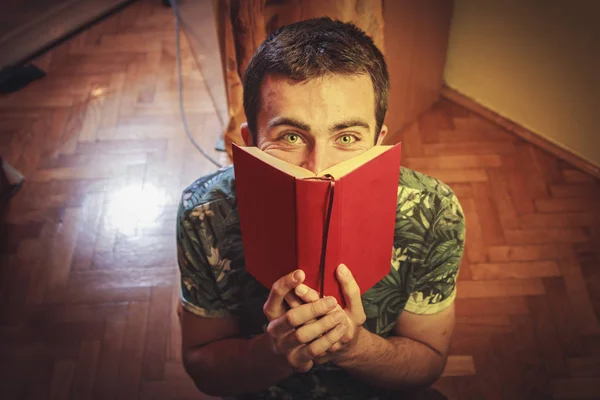 Young man loves to read books — Stock Photo, Image