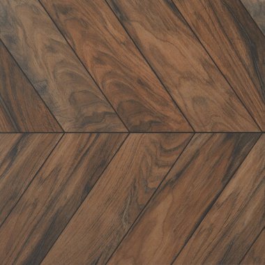 Geometrik desenli ahşap zemin ve duvardaki mozaik döşeme.