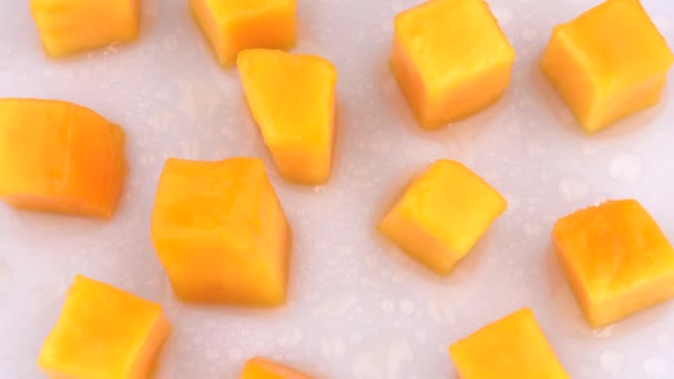 Juicy Mango Fruit Slices Rotating Turn Table — Stock Video