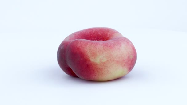 One Whole Doughnut Flat Peach Called Saturn — Stock Video