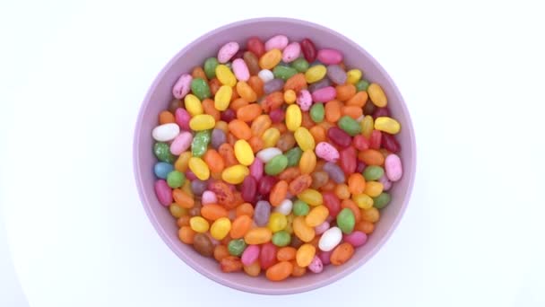 小さな豆の形をした砂糖ゼリーキャンディーの山 — ストック動画