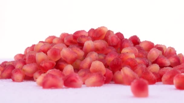 Pomegranate Seeds Drops Water Rotating — Stock Video