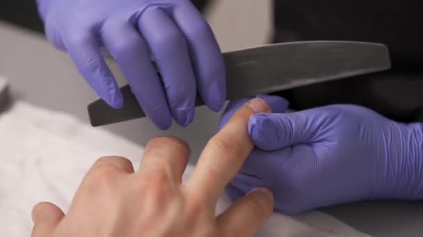 Close Manicurist Hands Violet Gloves — Stock Video