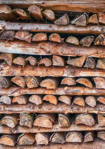 Stacked brown fire wood — Stock Photo, Image