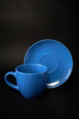 Açık mavi fincan ve çay tabağı.