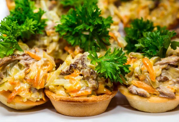 Snacks, tartlets with salad — Stock Photo, Image