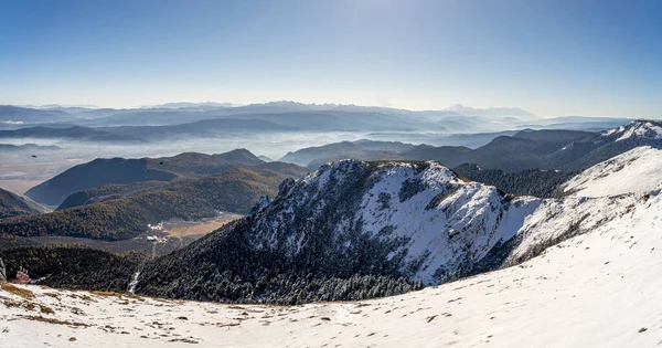 Snow Mountain and dry grass land