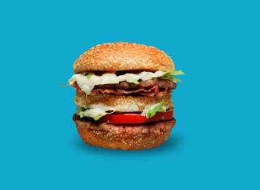 Mavi arka plan üzerinde büyük hamburger