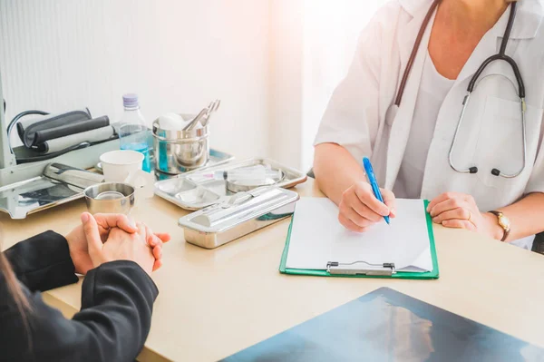 Senior Female Doctor Meet Patient Discussing Making Notes Symptom Problem — Stock Photo, Image