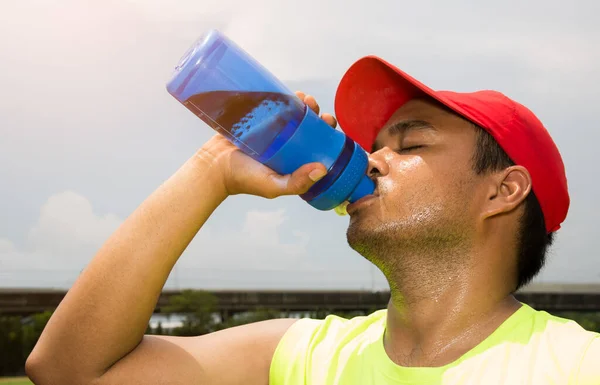 Young Man Drinking Water Running — Stock Photo, Image