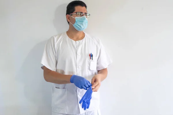 Doctor Nurse Putting Gloves Protect Coronavirus Wears Masks Glasses His — Stock Photo, Image