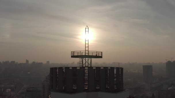 Silhouette of a roof spire. sunset and evening city center — Stock Video