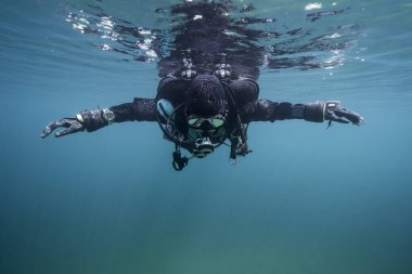scuba diver underwater below surface clipart