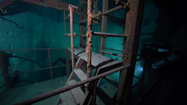 Scuba Divers Underwater Flooded Mine Rusty Artefacts — Stock Video