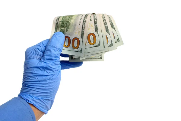 Mão Doutor Uma Luva Médica Mantém Dólares Fundo Branco Isolado — Fotografia de Stock