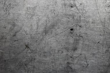 Hafif desenli çizik paslanmaz çelik yüzey. Yazı ya da metin için boş. Tasarım için substrat.