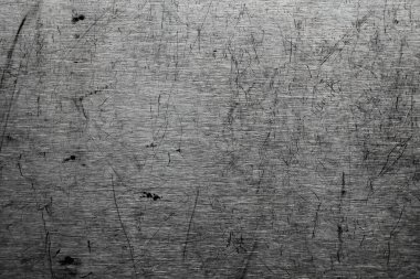 Hafif desenli çizik paslanmaz çelik yüzey. Yazı ya da metin için boş. Tasarım için substrat.