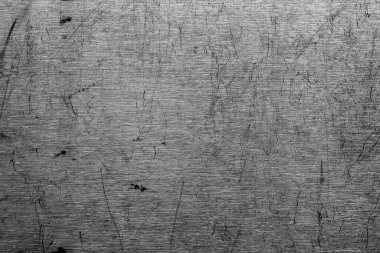 Hafif desenli çizik paslanmaz çelik yüzey. Yazı ya da metin için boş. Tasarım için substrat.