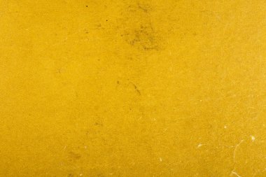 Grunge tarzı, modern tasarım için eski yüzeyin modaya uygun soyut arka planı. Lekeli sarı renk