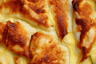 Güzel ve lezzetli fırında hamur işi yakın plan, arka plan