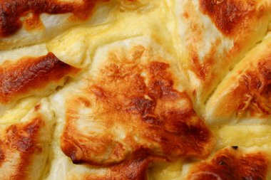 Güzel ve lezzetli fırında hamur işi yakın plan, arka plan