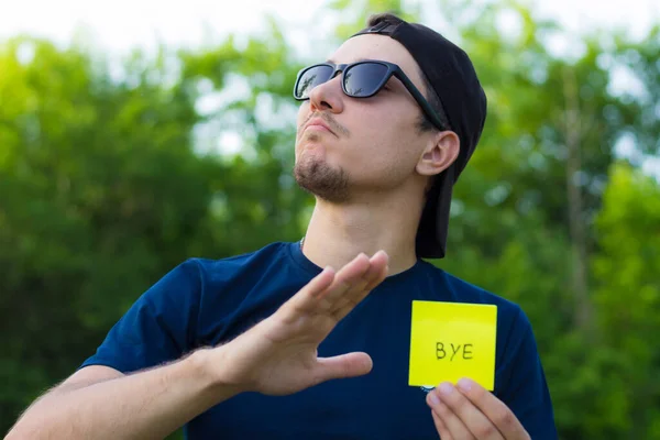 Klistermärke Med Inskriptionen Bye Den Manliga Handen Livsstil Tonad — Stockfoto