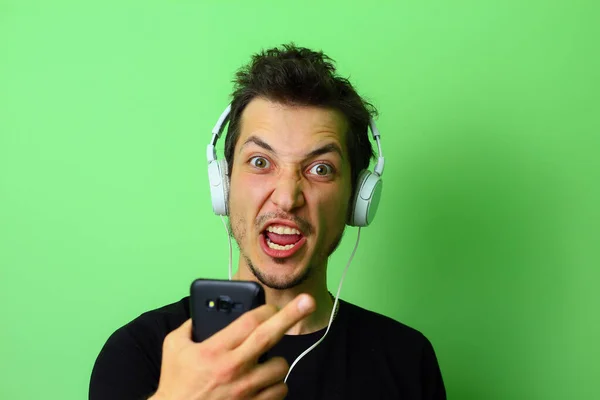 Angry Young Man Light Green Wall Background Emotion Aggression — Stock Photo, Image