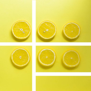 Minimum gıda konsepti. Parlak sarı arka planda limon. Metin için boş alan. Üst Manzara. Minimalizm. Yaratıcı narenciye.