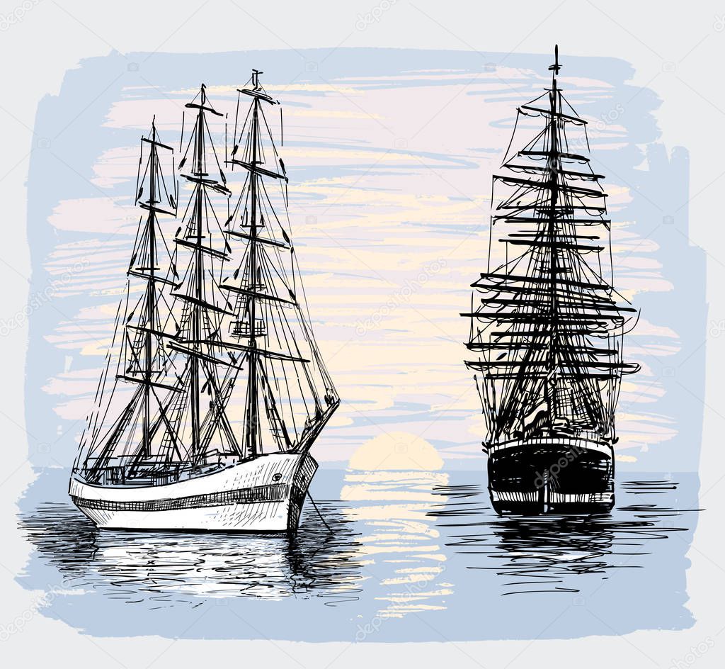 Sailboats in the sea at dawn