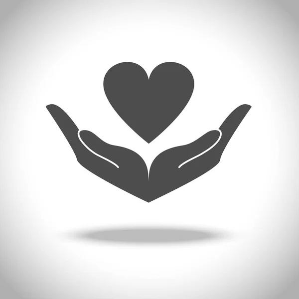 Kéz és a szív ikon — Stock Vector