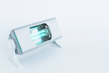 ev dezenfeksiyonu için mavi ışığı olan kompakt kuvars lambası, metin için boşluk, virüslerden korunma ve koronavirüs salgını, evde yalnızlık için sağlık hizmeti