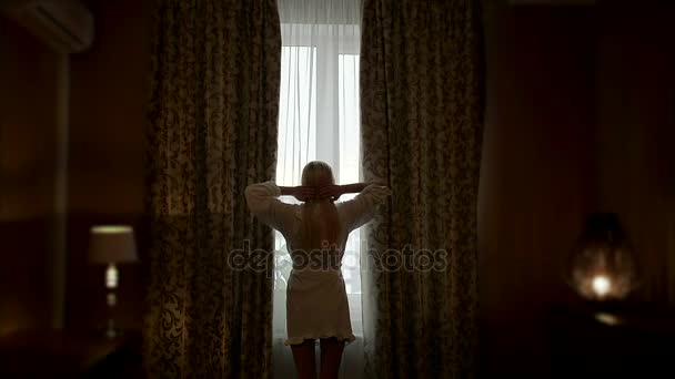 Young Beautiful Blonde Waking Up and Looking Out the Window — Stock Video