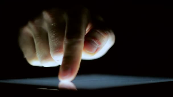 Close-Up Male Hand Touching Tablet at the Dark — Stock Video