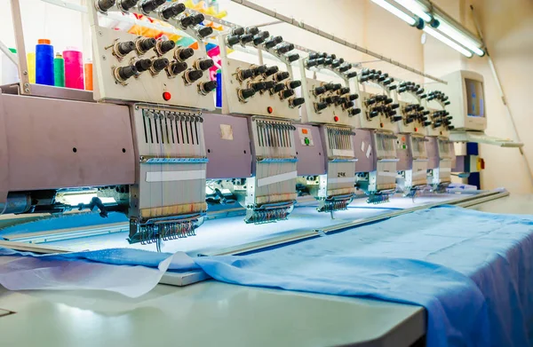 Professional embroidery equipment at the garment factory — Stock Photo, Image