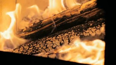 SLOW MOTION: close-up of a male hand slowly opens the fireplace door in home.
