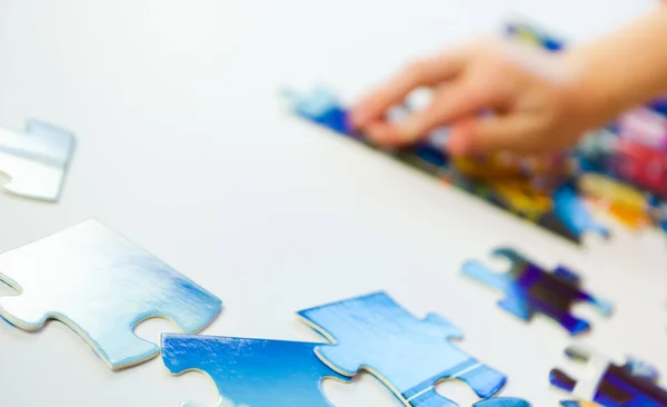 Little Hand Five Year Old Girl Puts Together Puzzle Kids Stock Photo