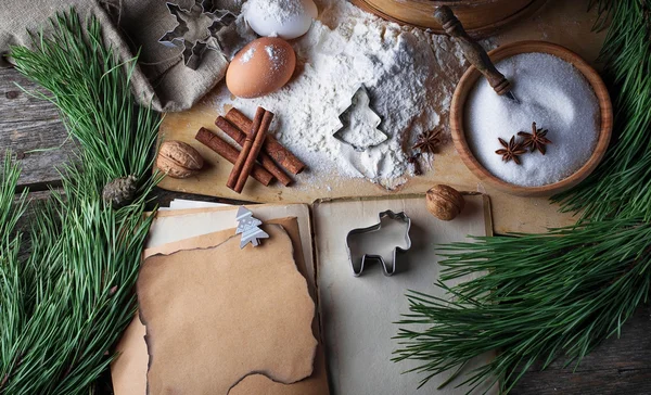 Ingredients for Christmas cookies and recipe book — Stock Photo, Image