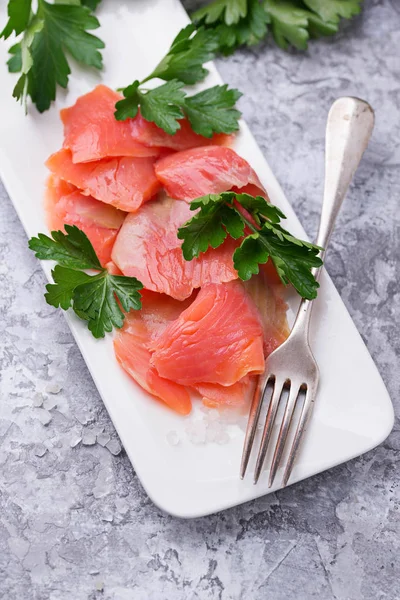 Smoked salmon fillet with parsley — Stock Photo, Image