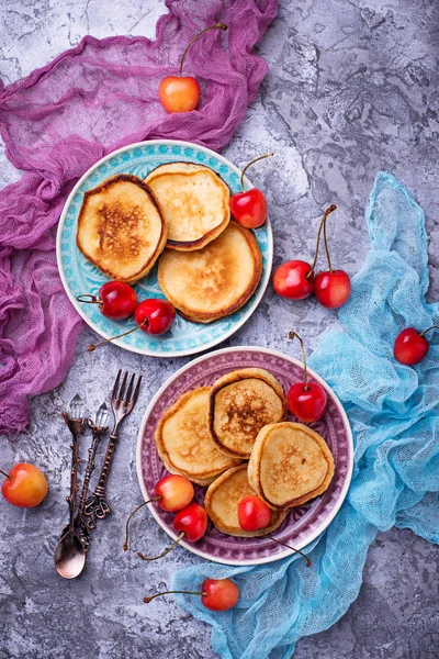 Pancakes with cherry — Stock Photo, Image