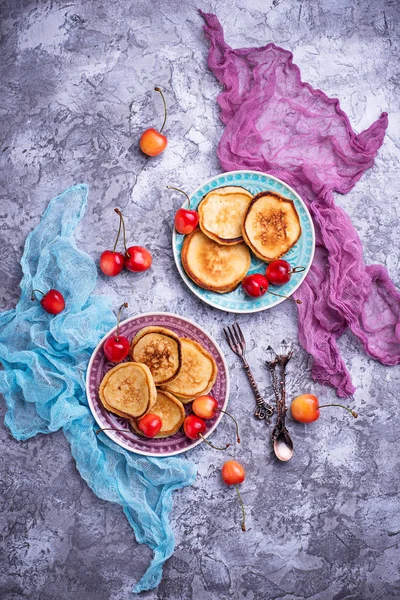 Pancakes with cherry — Stock Photo, Image