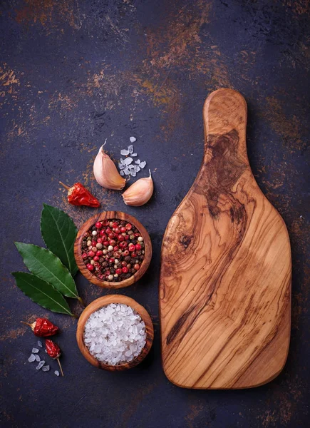 Cutting board with herbs and spices. Royalty Free Stock Images