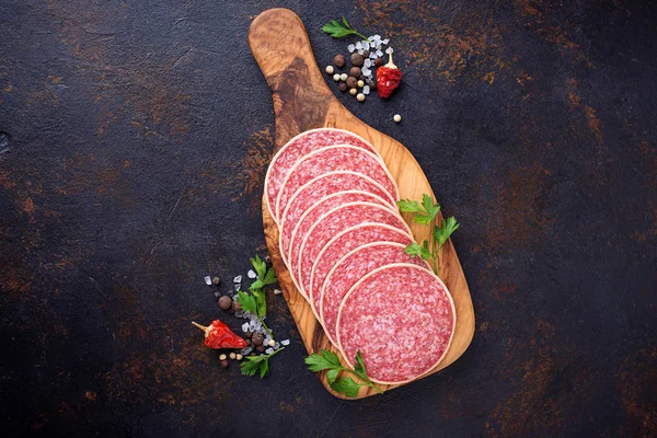 Italian salami sausage on wooden board. — Stock Photo, Image