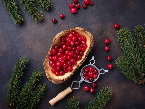 Fresh ripe cranberry in wooden bowl — Stock Photo, Image