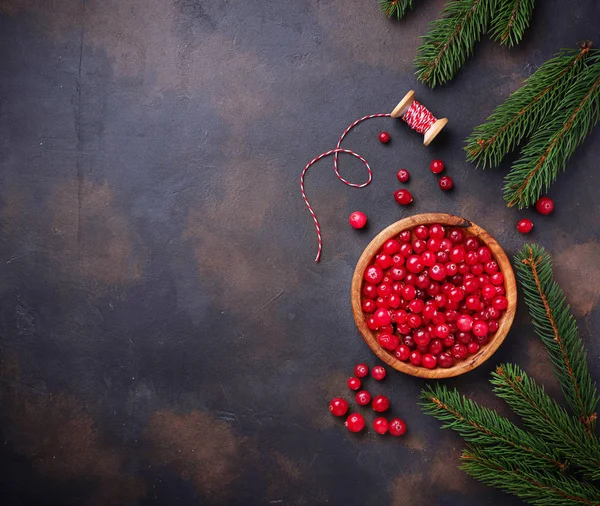 Fresh ripe cranberry in wooden bowl — Stock Photo, Image