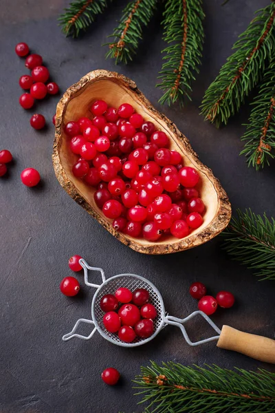 Fresh ripe cranberry in wooden bowl — Stock Photo, Image