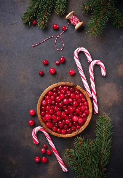 Fresh ripe cranberry in wooden bowl — Stock Photo, Image