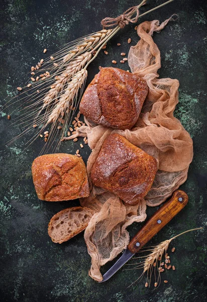 Fresh homemade buns on rustic background — Stock Photo, Image