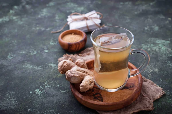 Ginger root and tea bags. — Stock Photo, Image